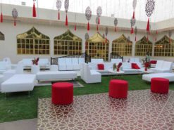 Round Red Pouffe, White Sofa