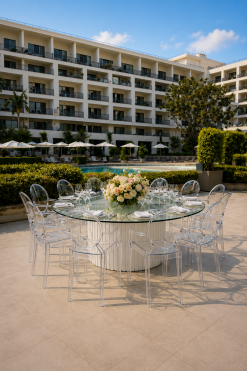 Glass Dining Table with Ghost chairs for gala dinners, weddings, private parties.